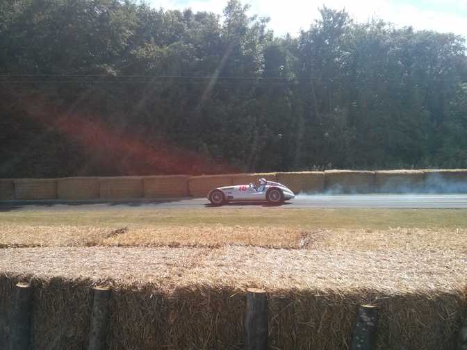 Jackie Stewart driving his classic Merc Silver Arrow